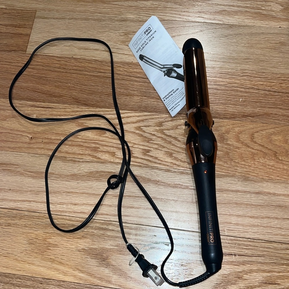 Rose gold, titanium, curling iron by Infiniti pro